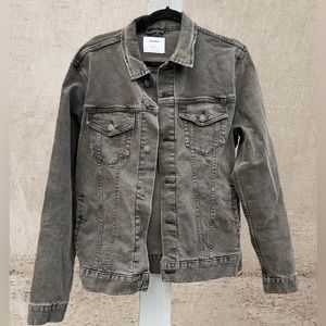 Distressed black jean jacket